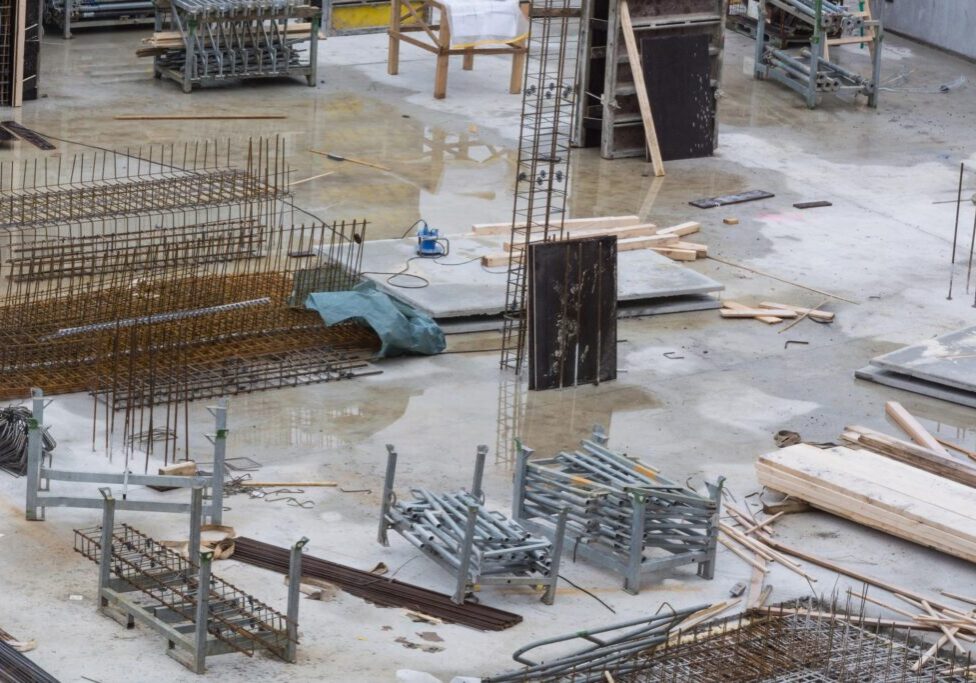 under construction site with metals and cement